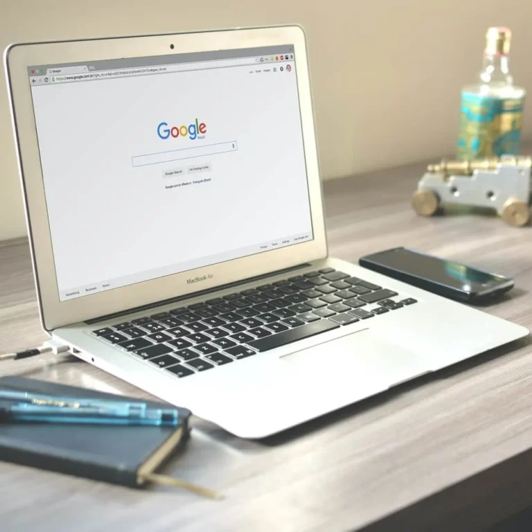 Laptop displaying Google search engine homepage