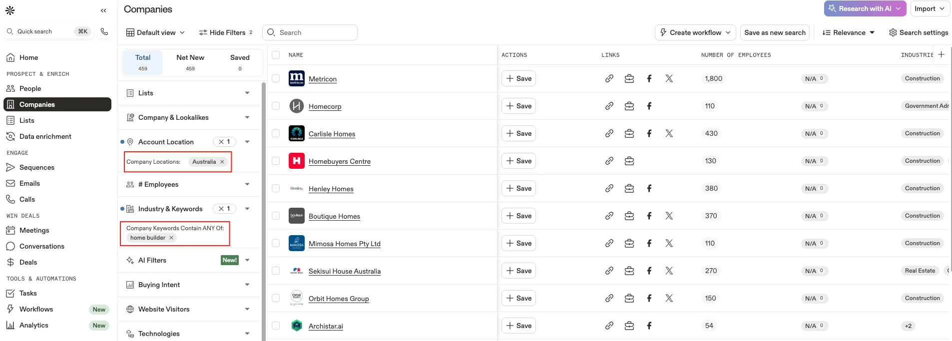 Apollo company filters by industry and keywords.
